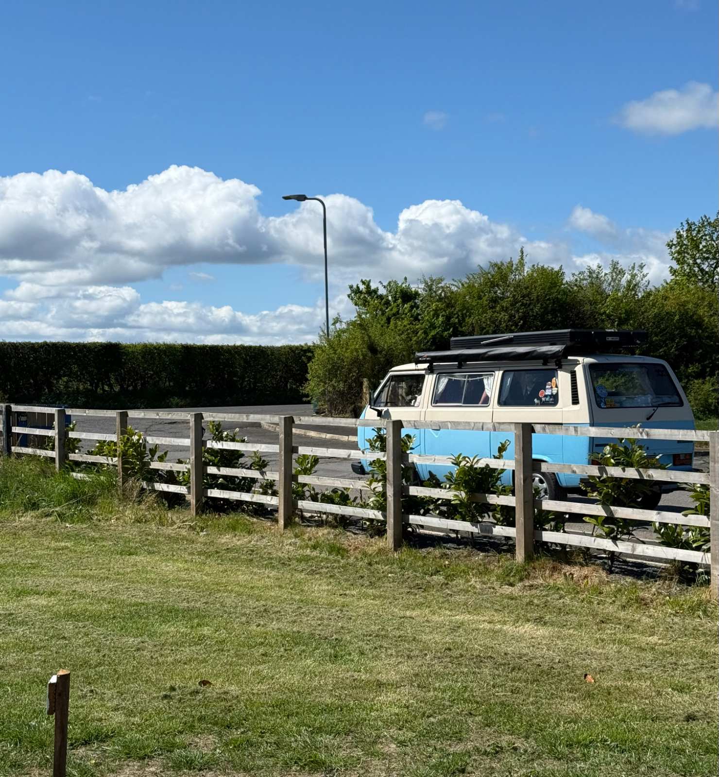 A vintage VW campervan parked up at Coast and Castles